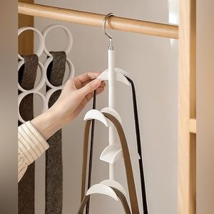 Rotating purse hanger